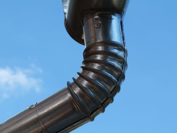 Metal Downspout Installation in Longmont