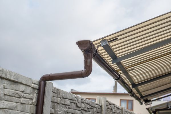 Plastic Downspout Installation in Longmont